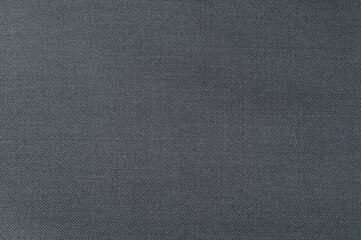 Textured dark fabric background ideal for design projects and clothing display