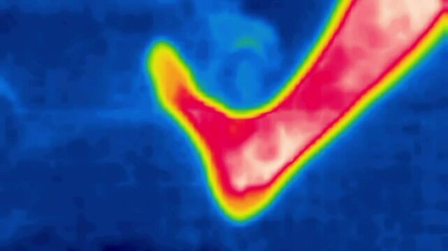 A man's leg (up to the knee). Foot movement, Image from thermal imager device