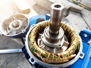 The internal components of an electric motor stator windings and  rotor shaft bearing in...