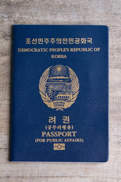 north korean citizen passport on grey background