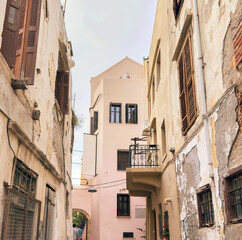 Fototapeta premium Chania, Old town architecture. Crete island Greece. Narrow street, old and new buildings