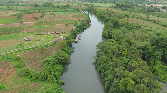 A river with green trees on both sides