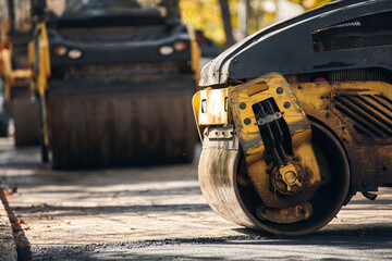 Public city street reconstrunction with heavy machines.