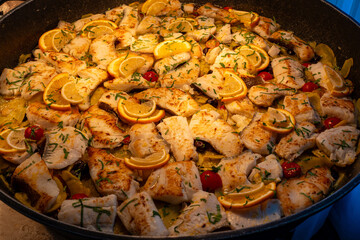 Close-up of a freshly baked pizza served in a restaurant setting. The image highlights the melted cheese, vibrant toppings, and crispy crust, evoking a warm and appetizing dining experience.