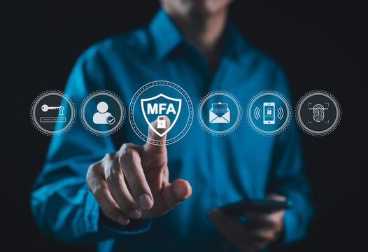 MFA, Multi-Factor Authentication Security Concept. Person touching virtual MFA shield icon with various security icons, representing multi factor authentication and digital identity protection.