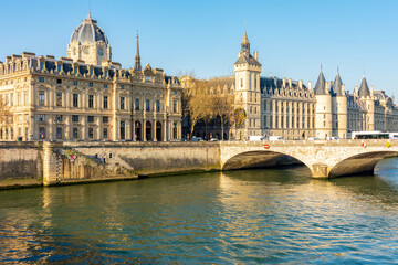 Paris commercial courthouse and Conciergerie palace on Cite island along Seine river, Paris, France