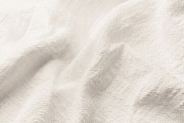  White wrinkled linen fabric texture background close up
