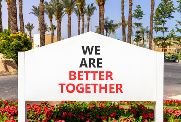 We are better together symbol. Concept words phrase We are better together on beautiful white road...