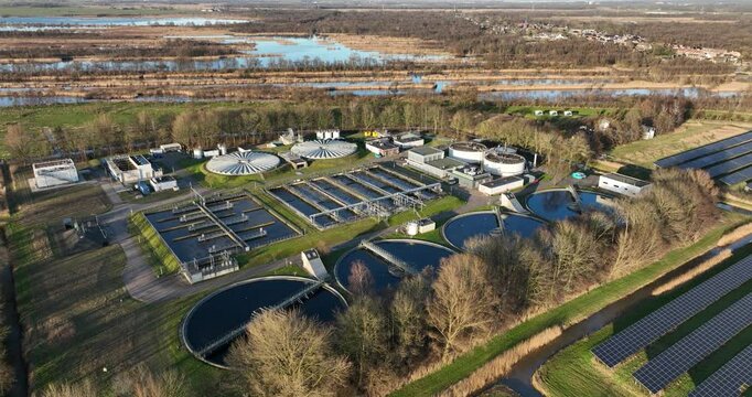 waste water treatment plant, cleaning of water, utility services, industrial installation. Aerial view.