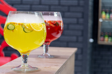Colorful cocktails served in elegant glasses at a vibrant bar