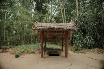 View of the guerrilla camp at Cu Chi tunnels were the location of several military campaigns during the Vietnam War, is now touristic destination. Travel concept.