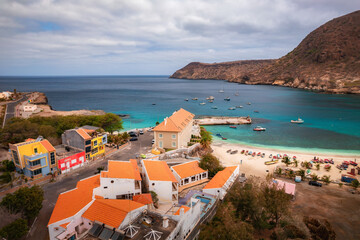 Beautiful Tarrafal Beach in Cape Verde, featuring soft white sand, clear turquoise waters, and a...