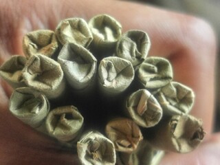 Collection of bidi or beedi. Indian desi cigarette or smoke background. Indian famous product of smoking. close up, side view and ariel view.