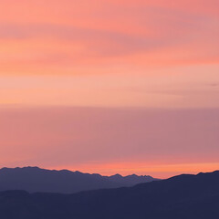 Obraz premium Sunset over Mountains