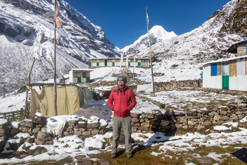 Sherpa Guide taking a photo in the himalaya. 