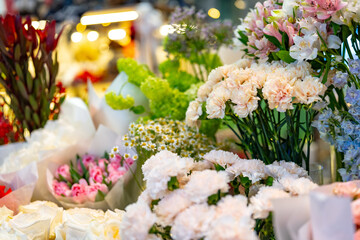 Plakat Colorful flower display at a local market showcasing seasonal blooms and fresh arrangements during the spring season