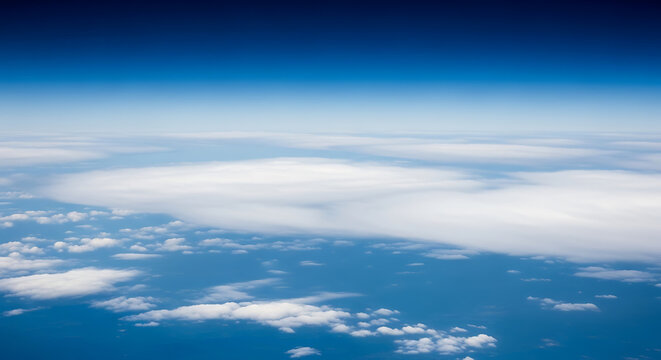 Aerial view of blue sky and fluffy clouds