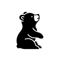 Obraz premium Bear Icon Sitting in Profile on a Simple Background 