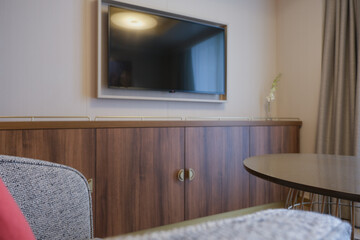 Luxurious mini suite stateroom cabin room onboard luxury cruise ship cruiseship ocean liner with...
