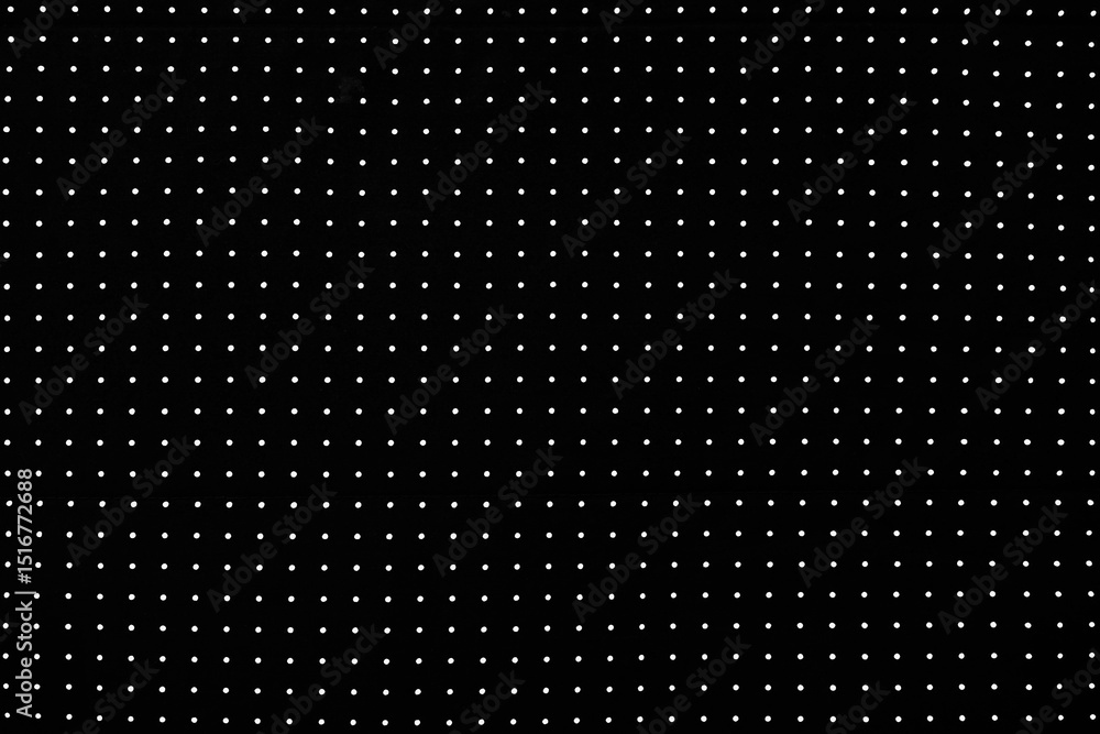 Poster a pattern of white dots on a black background