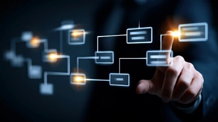 Hand touches illuminated flowchart nodes representing complex data connections against a dark backdrop - Powered by Adobe