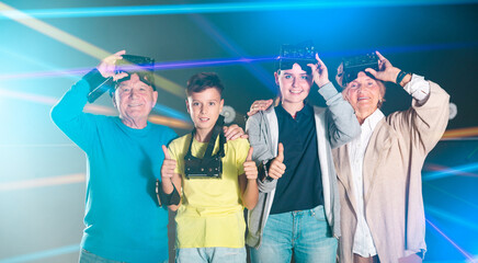 Portrait of happy family after using virtual reality glasses in the quest room
