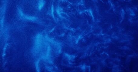 Abstract background. A dark blue liquid with sparkles shimmers and boils