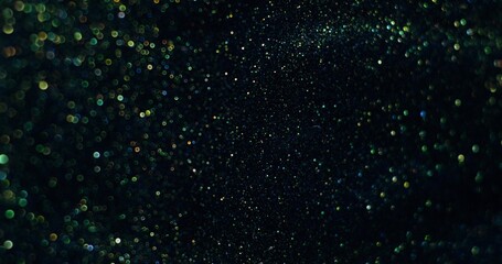 Abstract background. The blue-green sparkles are bubbling and shimmering.