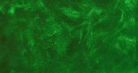 Abstract background. The green paint with sparkles shimmers