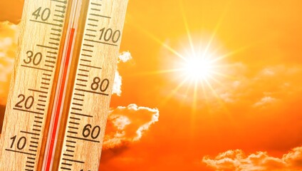 Thermometer indicating high temperature, summer heat wave. Climate change. Rising temperatures.