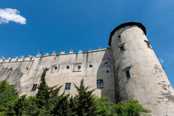 Detailed view of the outer wall and tower of Niedzica Castle in Poland, with historic architecture,...
