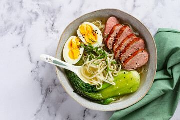 ramen soup with duck and noodles, with eggs and bok choy, homemade, no people,