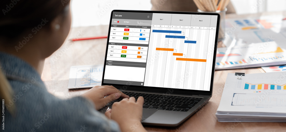 Aufkleber Project planning software for brisk business project management on the computer screen showing timeline chart of the team project