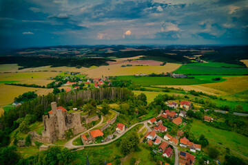 Naklejka premium Stunning Aerial View of a Magnificent Ancient Castle Enveloped by Verdant Lush Landscapes. Hanstein castle, Germany.