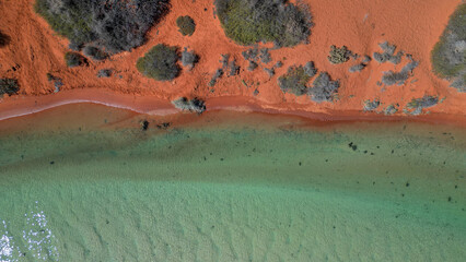 A creek running through the red soil of Australia, Western Australia, seen from above © Patrick