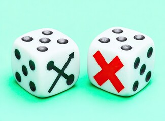 Two dice, one marked with an X and the other with a symbol resembling two crossed arrows, on a mint green background