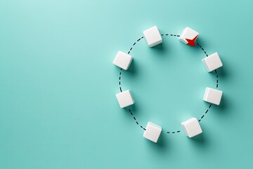 White cubes arranged in a circle with one highlighted