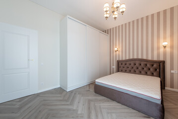 Elegant Home Bedroom With Modern Furniture and Striped Wall Decor