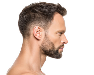 Handsome man with stylish hairstyle is shown profile, showcasing well groomed beard and strong jawline. His expression conveys confidence and sophistication, making him ideal subject for beauty