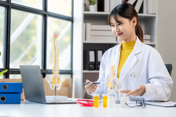 Female Doctor Explaining Spinal Anatomy Online