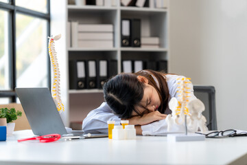 Exhausted Doctor Resting at Desk