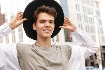 portrait of a trendy young man in the city