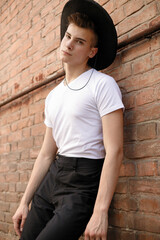 portrait of a trendy young man in the city