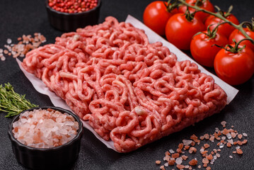 Raw ground beef or pork as an ingredient for burgers. Raw minced meat