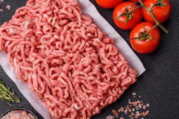 Raw ground beef or pork as an ingredient for burgers. Raw minced meat