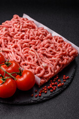 Raw ground beef or pork as an ingredient for burgers. Raw minced meat