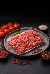 Raw ground beef or pork as an ingredient for burgers. Raw minced meat