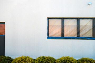 House renovation, protected doors and windows for building repainting