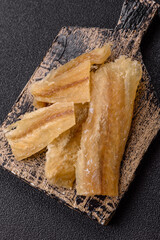Dried salted fish, snacks or jerky, slices of white fish fillets