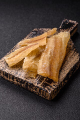 Dried salted fish, snacks or jerky, slices of white fish fillets